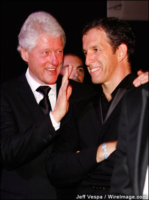 Former President Clinton with AmfAR chairman Kenneth Cole. Clinton told the crowd, 'When times get tough, give more, not less.'