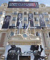 Billboards on the face of the Carlton hotel is looking a bit more low-key (photo: John Shearer/GettyImages).