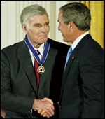 Charlton Heston and George W. Bush