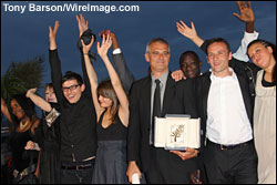 'The Class' (Entre les murs) director Laurent Cantet, center, winner of the Palme d'Or with cast members at Cannes Film Festival.