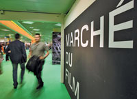 Festival's early acquisitions gave way to a quieter market floor Thursday.