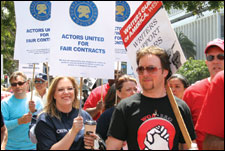 Scribes joined SAG members in protesting AFTRA's deal with the majors at a rally Monday at the union's Miracle Mile headquarters.