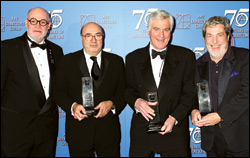 ADG prexy Thomas A. Walsh poses with winners Dante Ferretti, Stuart Craig and Lifetime Achievement Award honoree Tony Walton.