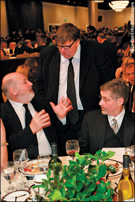Ron Reiner, Michael Moore and Barry Meyer