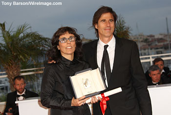 Directors Daniela Thomas, left, and Walter Salles pick up the actress award on behalf of Sandra Corveloni for her role in their movie 'Linha de passe' -- Cannes Film Festival -- May 25, 2008