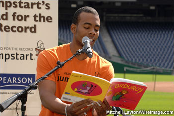 R&B singer Mario reads the book Corduroy to children from the Washington, D.C. area during Jumpstart's Read for the Record -- October 2, 2008