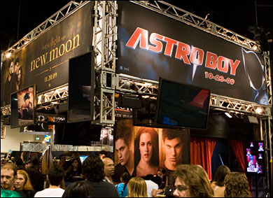 The Summit Entertainment booth promotes upcoming films 'Astro Boy' and 'The Twilight Saga: New Moon.'