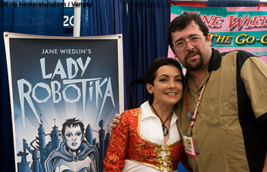 Jane Wiedlin, best known as a member of the band The Go-Go's, takes a photo with a fan. Her current project is comic book 'Lady Robotika.'
