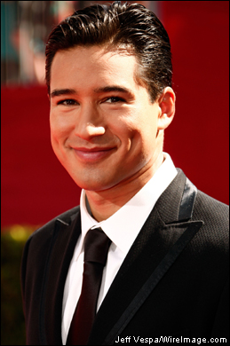 TV personality Mario Lopez smiles for the camera in front of the Nokia Theatre.