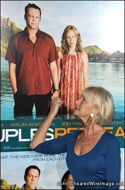 Helen Mirren grabs on to Vince Vaughn's hand at the preem.