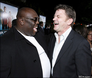 Thesps Faizon Love and John Michael Higgins have a laugh on the red carpet.
