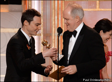Presenter Jim Parsons gives John Lithgow his best supporting TV actor Golden Globe for 'Dexter.'