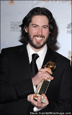 Jason Reitman, writer-director of the film 'Up in the Air,' poses backstage at the Beverly Hilton Hotel after sharing a screenplay Golden Globe win for the film with Sheldon Turner.