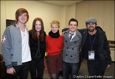 Eddie Hassell, Julianne Moore, Mia Wasikowska, Josh Hutchinson, and Mark Ruffalo pose arm in arm at the 2010 Sundance showing of 'The Kids Are All Right' in Park City.