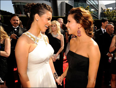 Kim Kardashian and Eva Longoria Parker catch up at the 62nd Annual Primetime Emmy Awards held at the Nokia Theatre L.A. Live on August 29, 2010 in Los Angeles, California. 